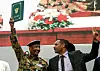 Sudan military man dressed in army uniform waves peace deal
