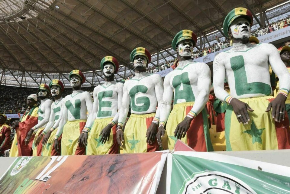 Senegal supporters are seen during the World Cup 2022 qualifying football match between Senegal and Egypt at the Me Abdoulaye Wade Stadium in Diamniadio on March 29, 2022. Senegal Becomes First African Team to Win a Game at the World Cup