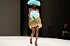 A model on the Lagos Fashion Week 2023 runway, wearing a piece from Lagos-based brand, LFJ.