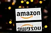 In this photo illustration an Amazon logo seen displayed on a smartphone.