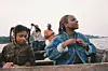 A photo of Patricia Bbaale Bandak and her daughter Imelda on a boat.