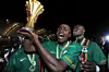 Noah Sikombe Chivuta of Zambia celebrates with the trophy after winning the 2012 African Cup of Nations Final between Zambia and Ivory Coast at the Stade de l'Amitie in Libreville, Gabon.