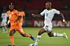 Ghana's midfielder Andre Ayew (R) challenges Ivory Coast's midfielder Serey Die during the 2015 African Cup of Nations final football match between Ivory Coast and Ghana in Bata on February 8, 2015.