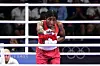 Cindy Winner Djankeu Ngamba of Refugee Olympic Team poses for a photo after winning the Women's 75kg Quarter-final match against Davina Michel of Team France on day nine of the Olympic Games Paris 2024 at North Paris Arena on August 04, 2024 in Paris, France.