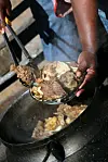 Mogodu, South African tripe stew served here by woman in Soweto.