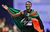 Muzala Samukonga of Team Zambia celebrates after finishing third in the men's 400m final at the Stade de France during the 2024 Paris Summer Olympic Games in Paris, France.