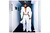 Flavour\u2019s white feather-trimmed suit with a see-through corset is by South African designer Rich Mnisi.