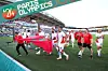 ​Team Morocco celebrates victory after the Men's Bronze Medal match between Egypt and Morocco during Day Thirteen of the Olympic Games Paris 2024 at Stade de la Beaujoire on August 08, 2024 in Nantes, France.