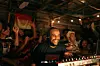 Ethiopian Records smiles while performing behind a mixer, surrounded by an energetic crowd at Boiler Room\u2019s first event in Addis Ababa.