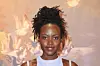 A photo of Lupita Nyong'o wearing a light blue sleeveless dress during 'The Wild Robot' Miami Screening at CMX Cinemas Dolphin 19 on September 18, 2024 in Doral, Florida.
