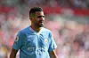 Riyad Mahrez of Manchester City look on during the Premier League match between Brentford FC and Manchester City at Gtech Community Stadium on May 28, 2023 in Brentford, England.