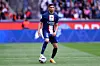 Achraf Hakimi of Paris Saint-Germain runs with the ball during the Ligue 1 match between Paris Saint-Germain and FC Lorient at Parc des Princes on April 30, 2023 in Paris, France.