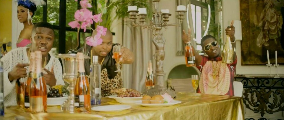 Emmy Gee Pops Bottles From Jozi To Lagos In The 'Rands And Nairas' Video Emmy Gee Pops Bottles From Jozi To Lagos In The 'Rands And Nairas' Video