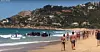 This Clip of Spanish Beachgoers Watching as an African Migrant Boat Lands Will Put Things In Perspective