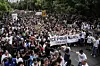 Crowds protest during a memorial march for French teenager, Nahel, on June 29, 2023 in Nanterre, France. The French teenager of North African origin was shot dead by police on June 27th, the third fatal traffic stop shooting this year in France - causing nationwide unrest and clashes with police forces. On June 28th, the victim's family called for a memorial march starting at Nanterre's main police station on June 29th.