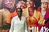 Nigerian filmmaker Bolanle Austen-Peters stands next to the poster of the film Funmilayo Ransome-Kuti in lagos on May 14, 2024.