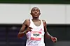 A photo of Rhonex Kipruto crossing the finish line in the Men's 10km (6.2miles) race during the Adizero: Road To Records 2023 on April 29, 2023 in Herzogenaurach, Germany.