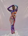 Fisayo Longe wearing Gaia dress in purple and orange