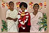 An image of an embroidered artwork from South African artist Talia Ramkilawan of three Indian women.