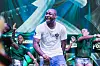 Nigerian Afrobeats Star Davido on stage in white shirt
