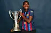 Asisat Oshoala of FC Barcelona poses for a photograph with the UEFA Women's Champions League trophy after the UEFA Women's Champions League final match between FC Barcelona and VfL Wolfsburg at PSV Stadion on June 03, 2023 in Eindhoven, Netherlands.