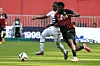 Nice's Nigerian forward Terem Moffi (R) fights for the ball with Rennes' Malian defender Hamari Traore (L) during the French L1 football match between OGC Nice and FC Rennes at the Allianz Riviera Stadium in Nice, south-eastern France, on May 6, 2023.