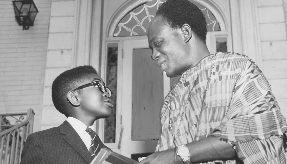 “He inspired over 250 million Africans, which includes the father of the first Black president of the United States. And it shows just how Nkrumah connects all of us, and it's so beautiful.” - Anita Afonu. A photo of Kwame Nkrumah passing a book to a young Black boy in Mooresville, North Carolina, 1960.