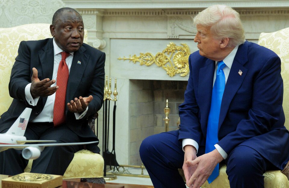 President of South Africa Cyril Ramaphosa (L) speaks as U.S. President Donald Trump listens during a meeting in the Oval Office of the White House on May 21, 2025 in Washington, DC.