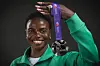 Silver medallist Nigeria's Tobi Amusan poses with her medal in the women's 100m hurdles final during a studio photo session on the sidelines of the World Athletics Championships in Tokyo on September 16, 2025.