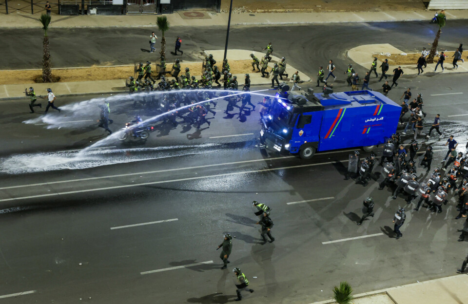 Security forces advance with a water-cannon vehicle to disperse protesters in Morocco on October 1, 2025. Security forces advance with a water-cannon vehicle to disperse protesters in Morocco.