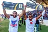 Roberto Lopes, left, and Deroy Duarte of Cape Verde celebrate their side's qualification for the 2026 FIFA World Cup with supporters after the FIFA World