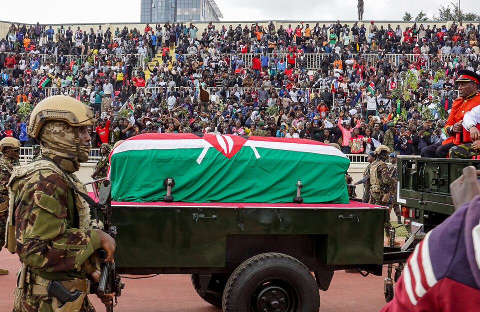 Two people were killed during a stampede at the funeral of Kenya’s former Prime Minister Raila Odinga, which was held at Nyayo Stadium on October 17, 2025, in Nairobi, Kenya. Military police escort the coffin with the body of Former Prime Minister Raila Odinga during a public funeral at a stadium, with crowds seen in the background