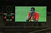 Angola's Zuela is shown on a big screen as he reacts to the 4-4 draw in the Group A African Nations Cup match between Angola and Mali, at the November 11 Stadium on January 10, 2010 in Luanda, Angola.