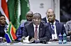 President Cyril Ramaphosa delivers remarks during a working dinner for invited African heads of state and government at the Sandton Convention Centre in Sandton on November 21, 2025