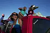 Izikhothane youth dance and display their clothes and cash on September 29, 2012, in Thokoza Park, Soweto, South Africa.