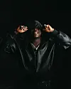 An image of Stonebwoy wearing a black leather jacket.