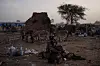 Refugees from Darfur in Sudan, gather at a relocation camp near the border on April 19, 2024 in Adre, Chad.