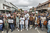 Protesters carry placards during a protest march against undocumented migrants in the town of Estcourt on April 24, 2026.