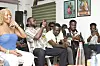 A group of people recording with their phones at OkayAfrica's Culture Cafe in Accra.