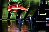 Emmanuel Macron and William Ruto stand on stage during a concert event in Nairobi.