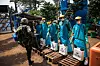 A United Nations peacekeeper has his shoes cleaned with a chlorine solution before leaving an Ebola treatment center in Mangina, North Kivu province, on September 1, 2019.