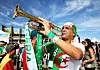 An Algeria fan plays the trumpet prior to the 2014 FIFA World Cup Brazil Group H match between Belgium and Algeria at Estadio Mineirao on June 17, 2014 in Belo Horizonte, Brazil.