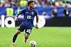 Ryan Mendes of Cabo Verde dribbles the ball on the field during a World Cup match in Houston.