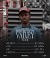 Poster featuring a man in a red cap advertising the Redemption Valley Tour with city dates listed below.