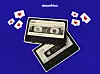 Playing cards, heart symbols, and dollar bills arranged on a blue surface.