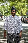 A photo of South African musician, teacher, and mentor PitsiRa YaMabala standing in the middle of a street.