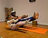 PitsiRa YaMabala and one of his students practicing yoga.