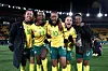 South Africa players celebrate together on the field after advancing in the Women's World Cup.