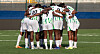 Nigeria's Super Falcons huddle together on the pitch during a friendly match at Remo Stadium.
