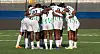 Nigeria's Super Falcons huddle together on the pitch during a friendly match at Remo Stadium.